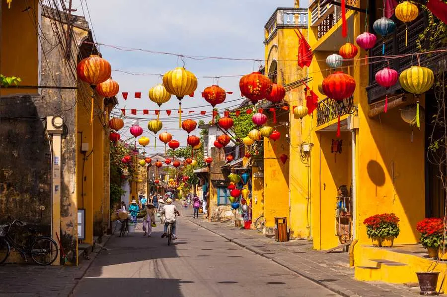 Colourful lanterns above a traditional street in Hoi An